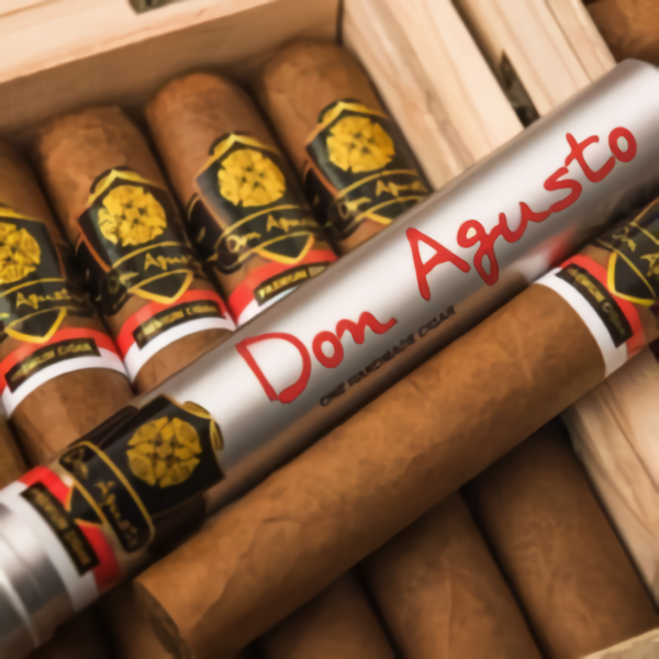 Don Agusto cigars resting in an open cedar box