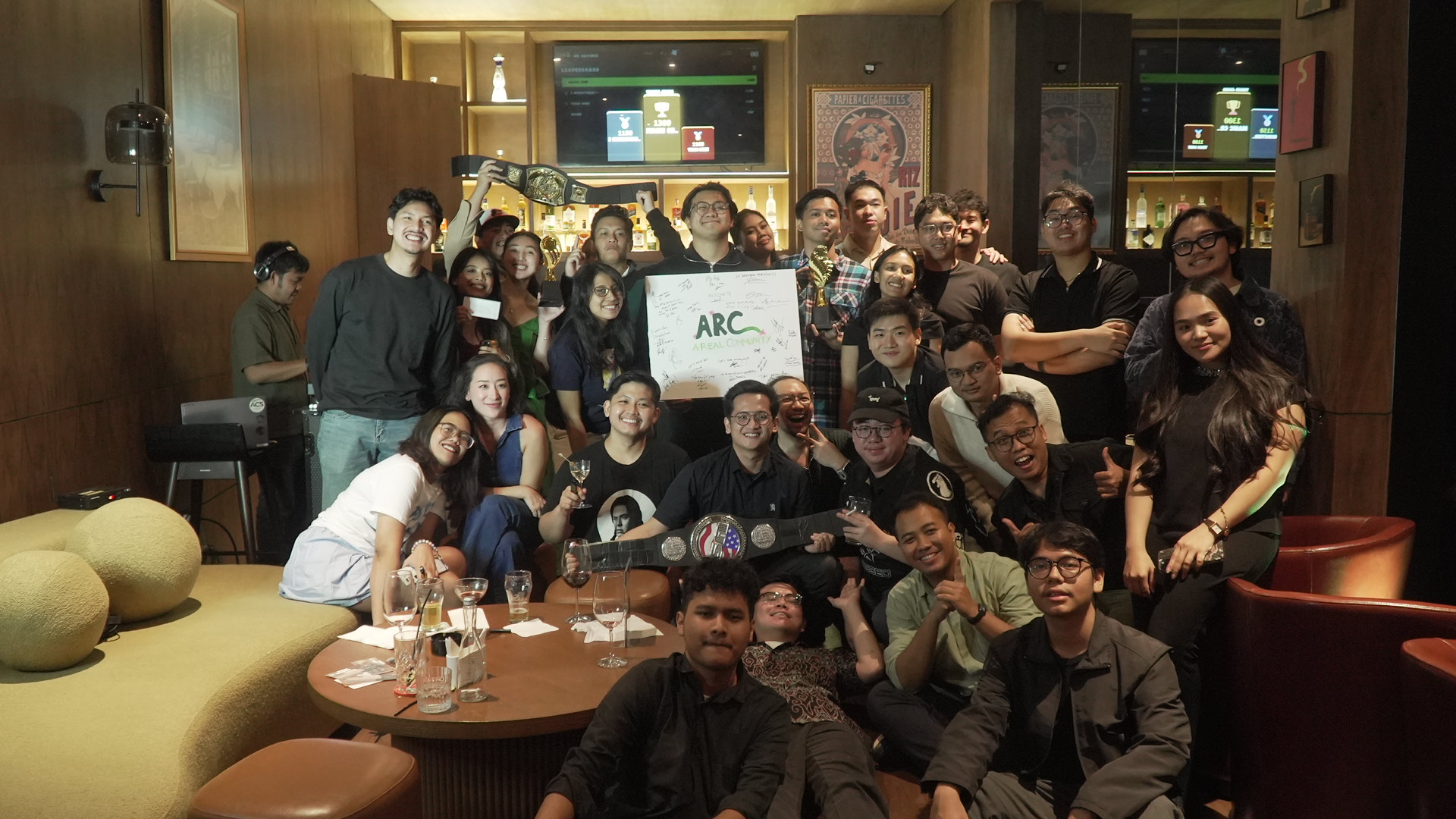 Group photo of the full ARC Trivia Night crowd at Le Baron Lounge